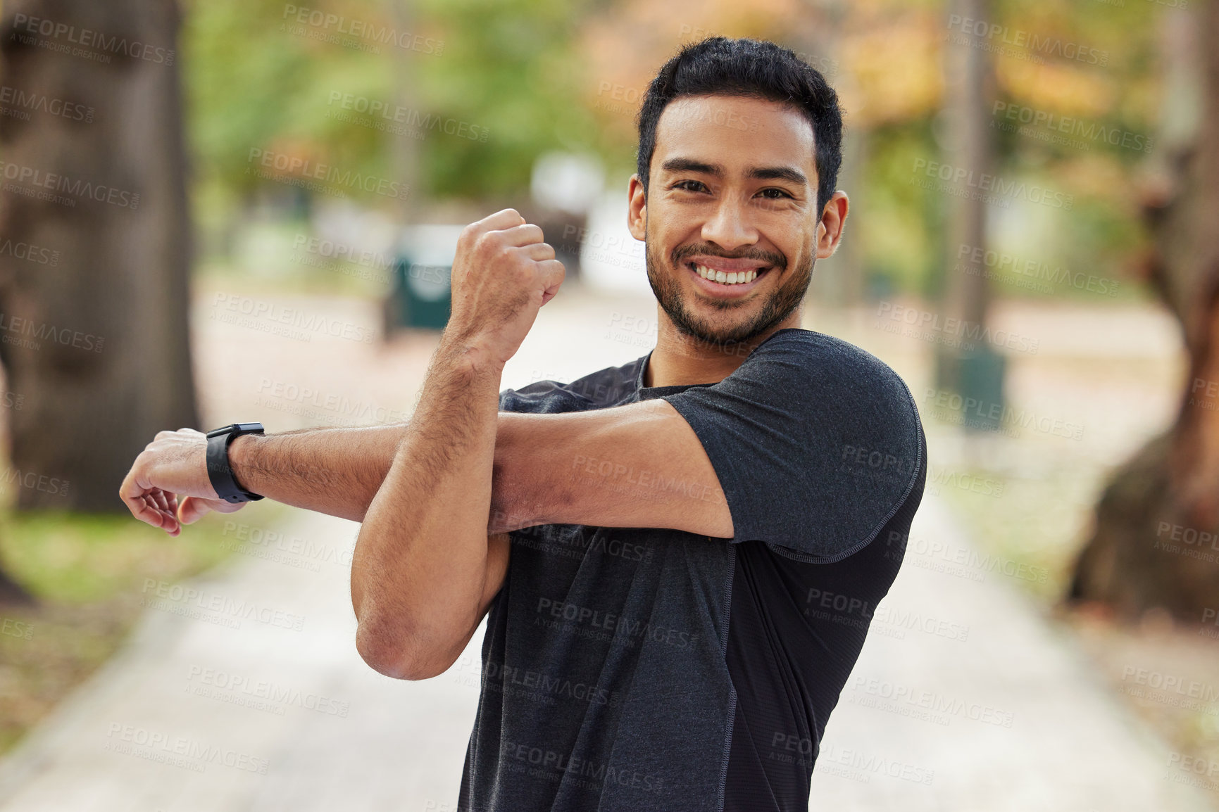 Buy stock photo Happy asian man, portrait and stretching arms in fitness getting ready for running, workout or exercise at the park. Male person or runner with smile in warm up arm stretch, training or run in nature