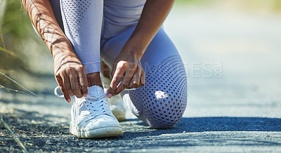 Buy stock photo Woman tying laces, sneakers and hands, start run for fitness and cardio, health and active person outdoor. Female runner, healthy and active, ready for training and race shoes with mockup space