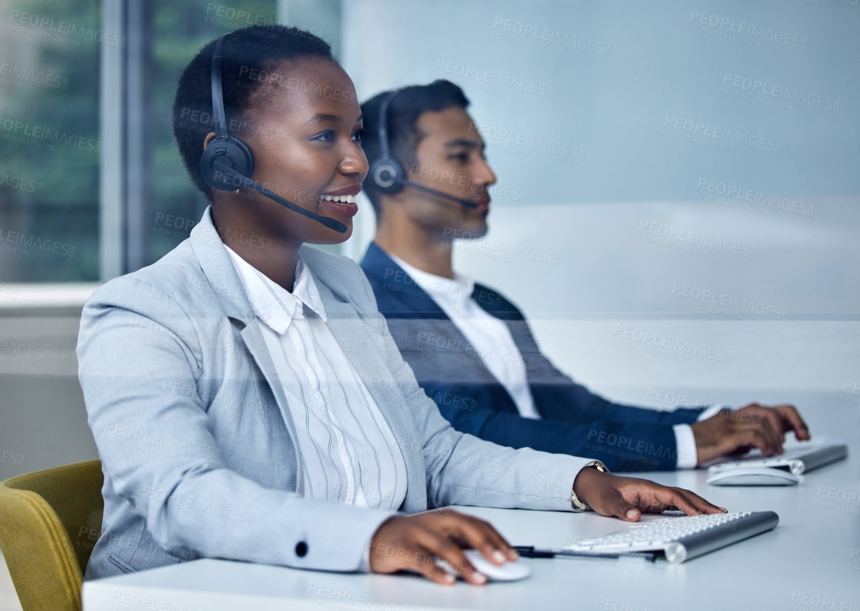 Buy stock photo Call center, black woman and office with computer, headset and team for communication in company. Consultant, operator and telemarketing with customer service for tech support, smile and web crm.