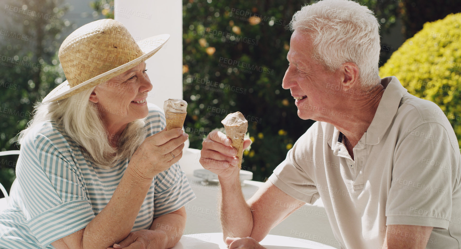 Buy stock photo Senior, couple or ice cream in garden with talk for retirement, planning vacation for anniversary. Husband, wife or old on patio for conversation with gelato, sunshine in summer with partner in home