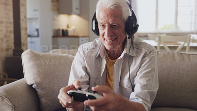Buy stock photo Headphones, senior man and joystick for video game, online streaming and relax for retirement at home. Technology, elderly person and happiness with smile from esports, gaming and challenge on sofa