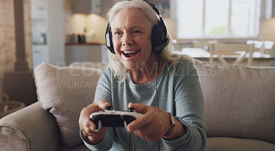 Buy stock photo Headphones, senior woman and joystick for video game, online streaming and relax for retirement at home. Technology, elderly person and happiness with smile from esports, gaming and challenge on sofa