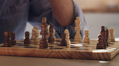 Buy stock photo Game, hands and play of chess, table and board of wood, strategy and challenge for person, house and relax. Home, problem solving and contest or hobby, skill and brain for competition in weekend