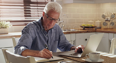 Buy stock photo Finance, laptop and writing with senior man in kitchen of home for investment, pension or retirement. Computer, savings and tax with elderly person in apartment for payment of bill, debt or invoice
