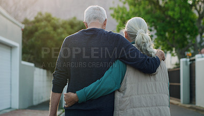 Buy stock photo Senior couple, walk and hug in city, road and driveway of house for love, peace and support outdoor. Elderly people, freedom and retirement together in nature, environment or urban with back view