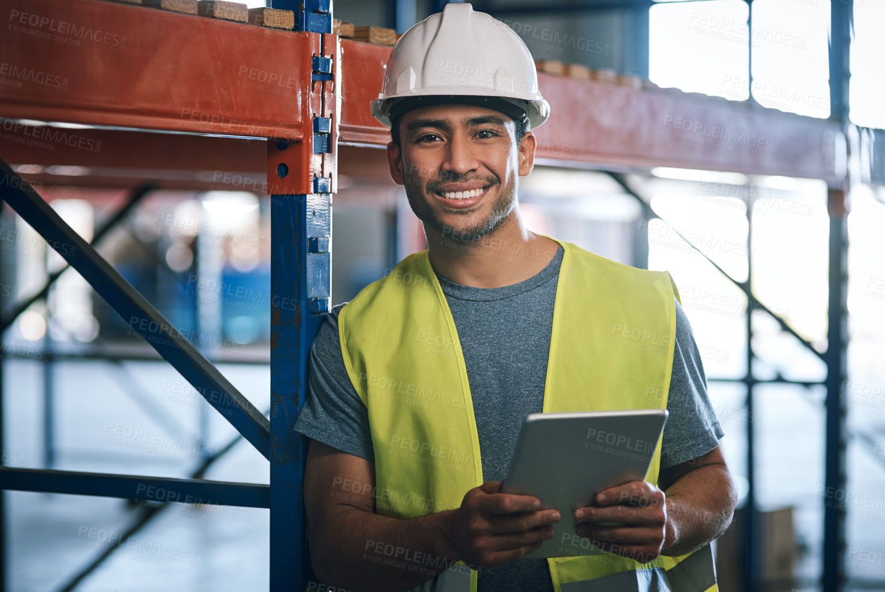 Buy stock photo Shot of a builder using a digital tablet while working at a construction site