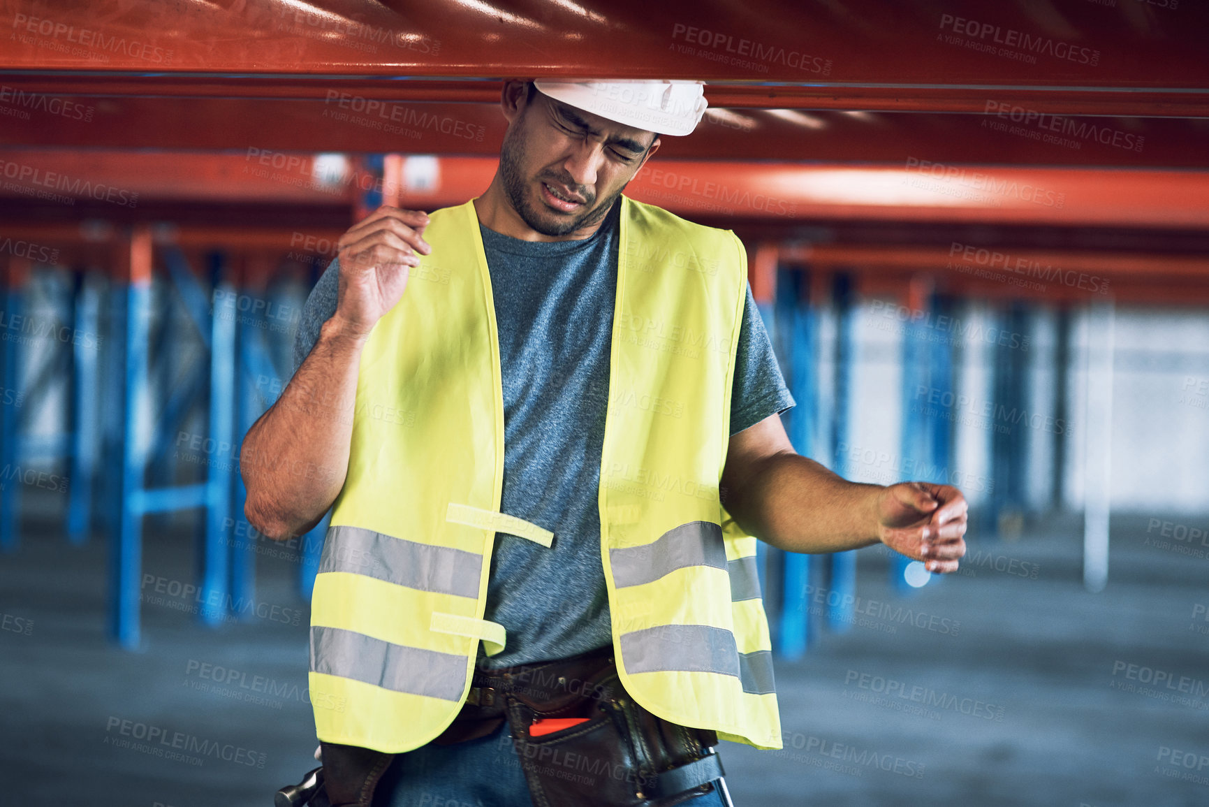 Buy stock photo Man, builder and head injury with helmet on steel bar in construction site or warehouse. Male person, contractor or pain with architecture mistake for bad safety, accident or risk in storage depot