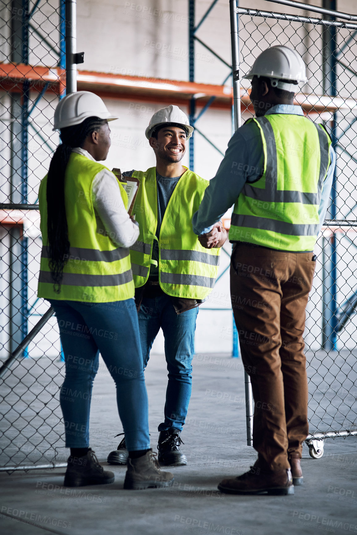 Buy stock photo Builder, team and handshake at a construction site for a collaboration and partnership. Professional, contractor
and greeting at a warehouse for a job and project with a contract at a company. 