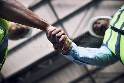 Buy stock photo People, architect and handshake in construction, hiring or building in teamwork partnership on site. Low angle of contractor or engineer shaking hands in recruiting, architecture agreement or deal