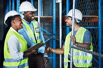 Buy stock photo Contractor, team and shake hands at a warehouse for hiring and collaboration at a building company. Builder, together and shaking hand at a construction site for partnership and welcome by leader.