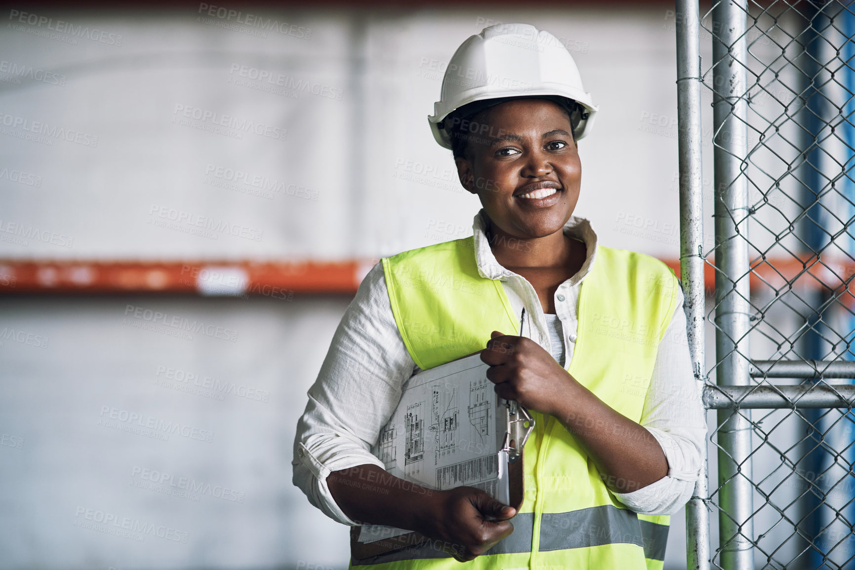 Buy stock photo Portrait of a confident young woman working a construction site