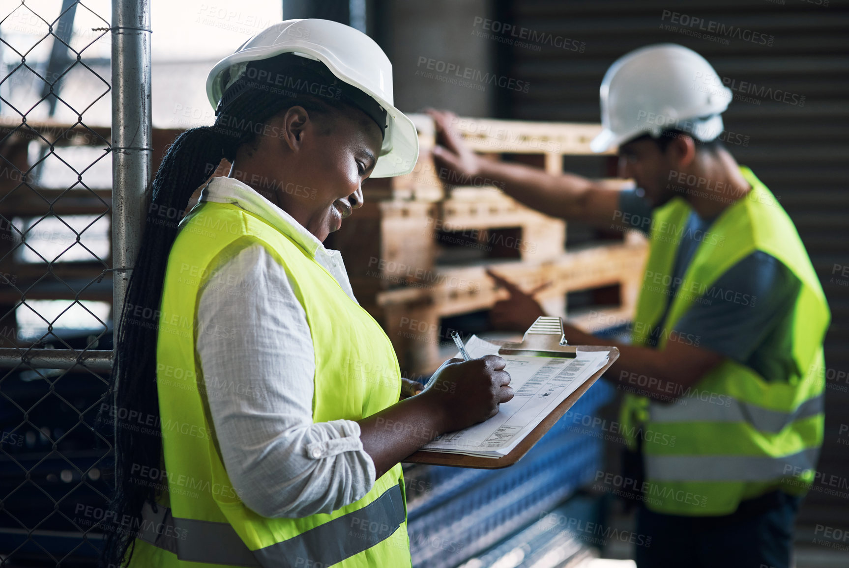 Buy stock photo Shot of a young builder inspecting a construction site