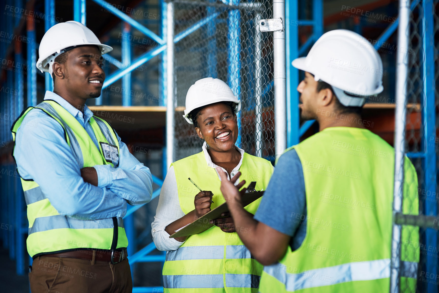 Buy stock photo Shot of a group of builders inspecting a construction site