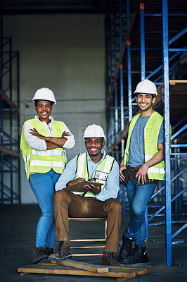 Buy stock photo Portrait of a group of builders working at a construction site