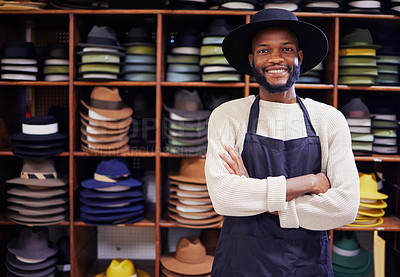 Buy stock photo Shot of a young man working at his job in a shop