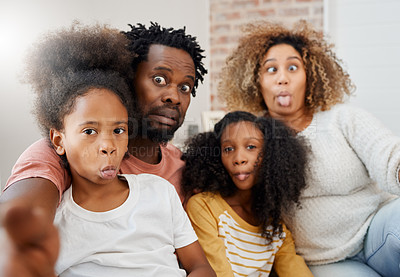 Buy stock photo African family, selfie and funny face in portrait at home with bond, care or relax with social media app. Happy father, mother and daughters together for profile picture, comic photography and joke