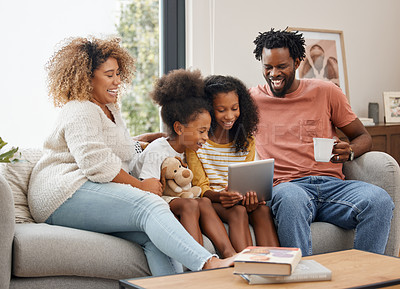 Buy stock photo Black family, kids and tablet for gaming, streaming or video on sofa of living room in home together. Coffee, technology and parents with girl children in apartment for homework, research or study