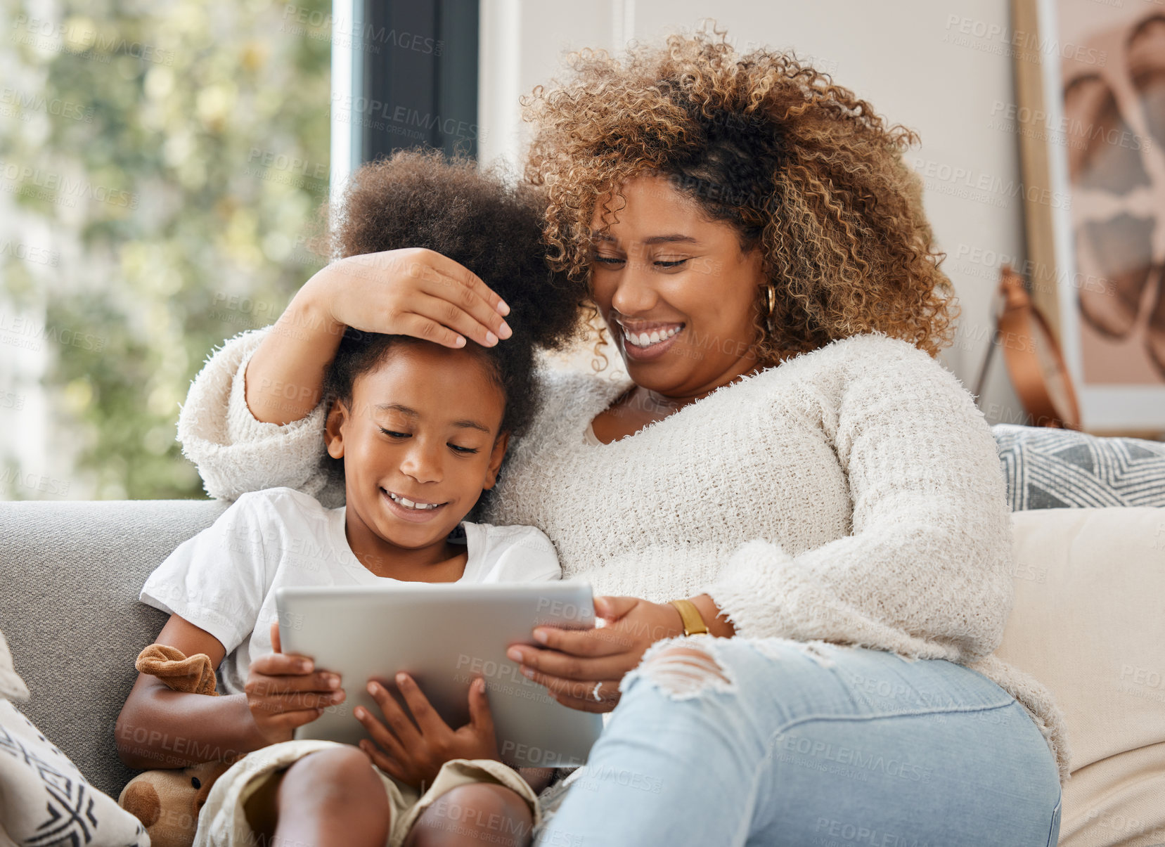 Buy stock photo Black family, laughing and tablet for education, gaming or streaming on sofa of living room in home together. Smile, technology and mother with girl kid in apartment for homework, research or study