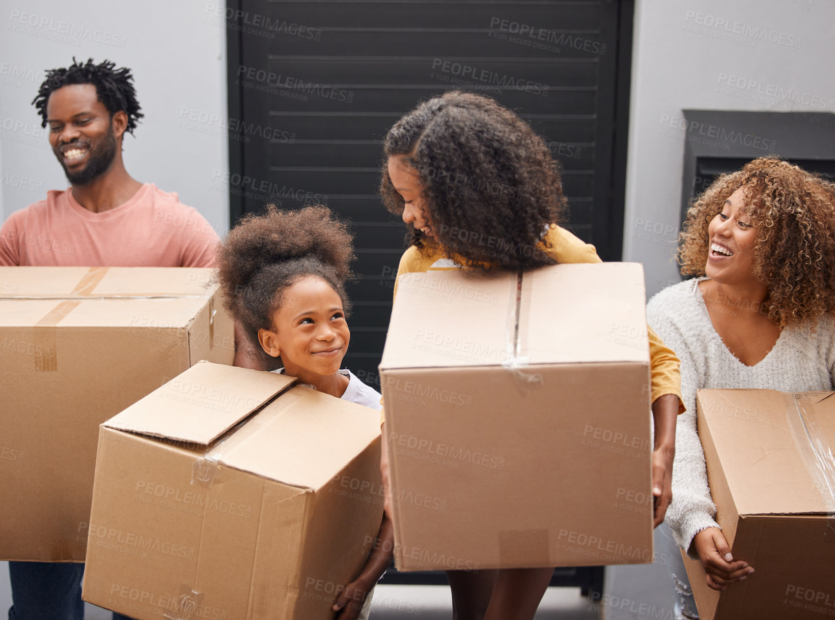 Buy stock photo Happy, family and moving with boxes in new home for real estate, walking or together for future. Group, people and house with investment or growth for children, welcome or property with mortgage