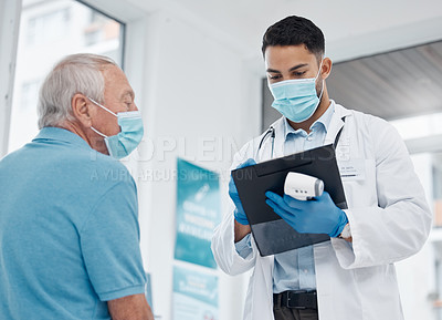 Buy stock photo Shot of a young doctor talking to a patient in an office