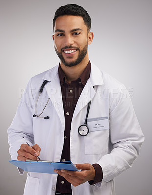 Buy stock photo Doctor, studio portrait and man with clipboard for patient report, consultation notes and test results. Male medical worker, stethoscope and document for surgery, healthcare advice and administration