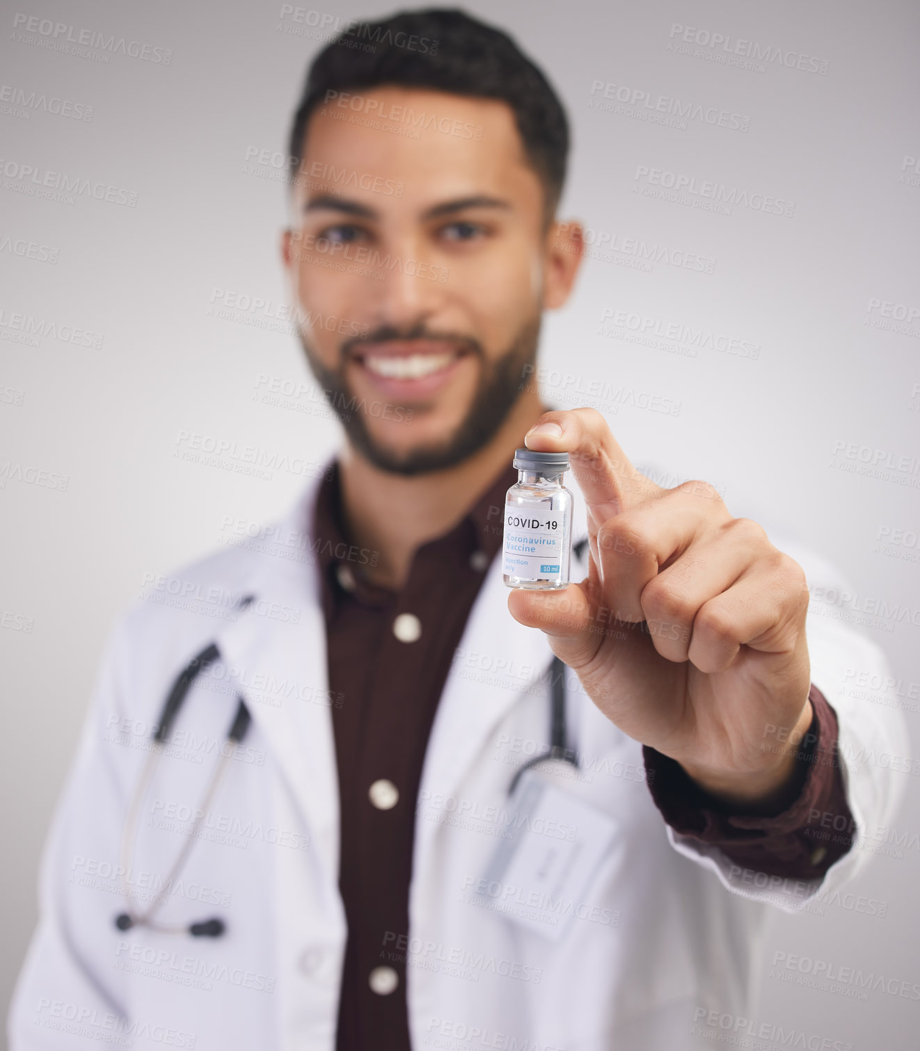 Buy stock photo Doctor, studio portrait and man with vial for vaccine for infection, disease protection and innovation in medical science. Male health expert, medicine and booster shot for flu, malaria and measles