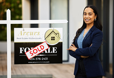 Buy stock photo Sold board, realtor woman and portrait with arms crossed for home investment, property sale and agency success. Happy face of real estate agent, landlord or biracial person, new house poster or sign