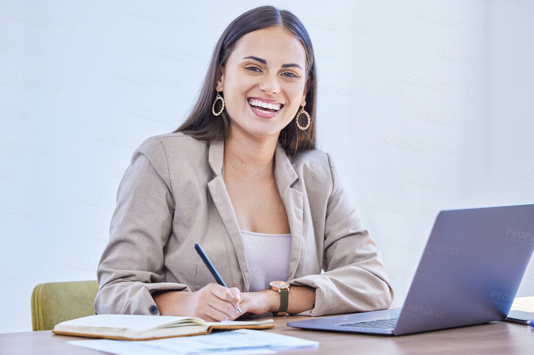 Buy stock photo Laptop, portrait and business woman writing notes for project, research or information online in office. Face, smile and secretary on notebook for planning schedule, report and laughing in Spain