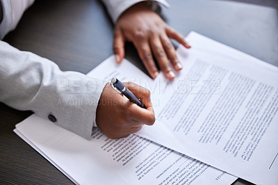 Buy stock photo Cropped shot of a businesswoman signing paperwork in an office