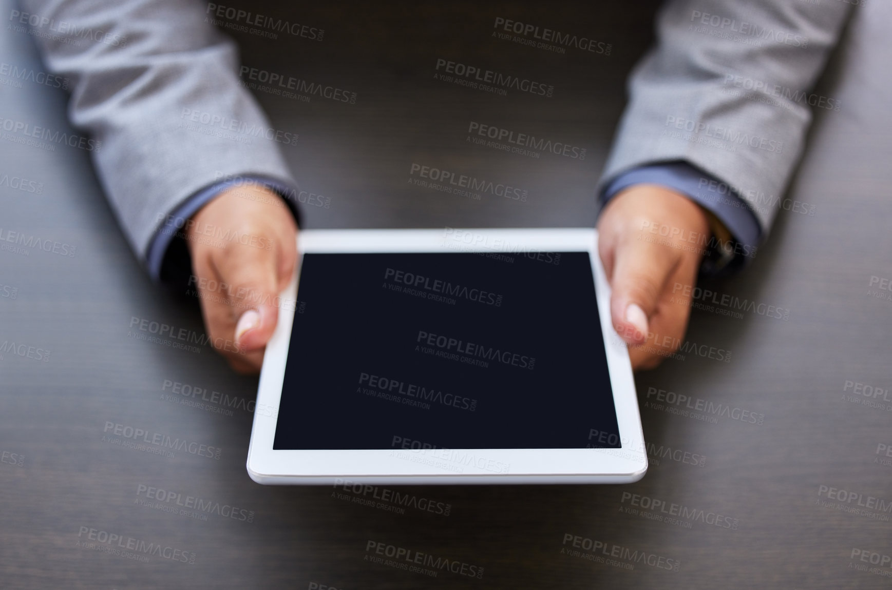 Buy stock photo Business person, hands and tablet with screen for online browsing, news or research above at office. Closeup of employee with technology display or mockup space for innovation or productivity on desk