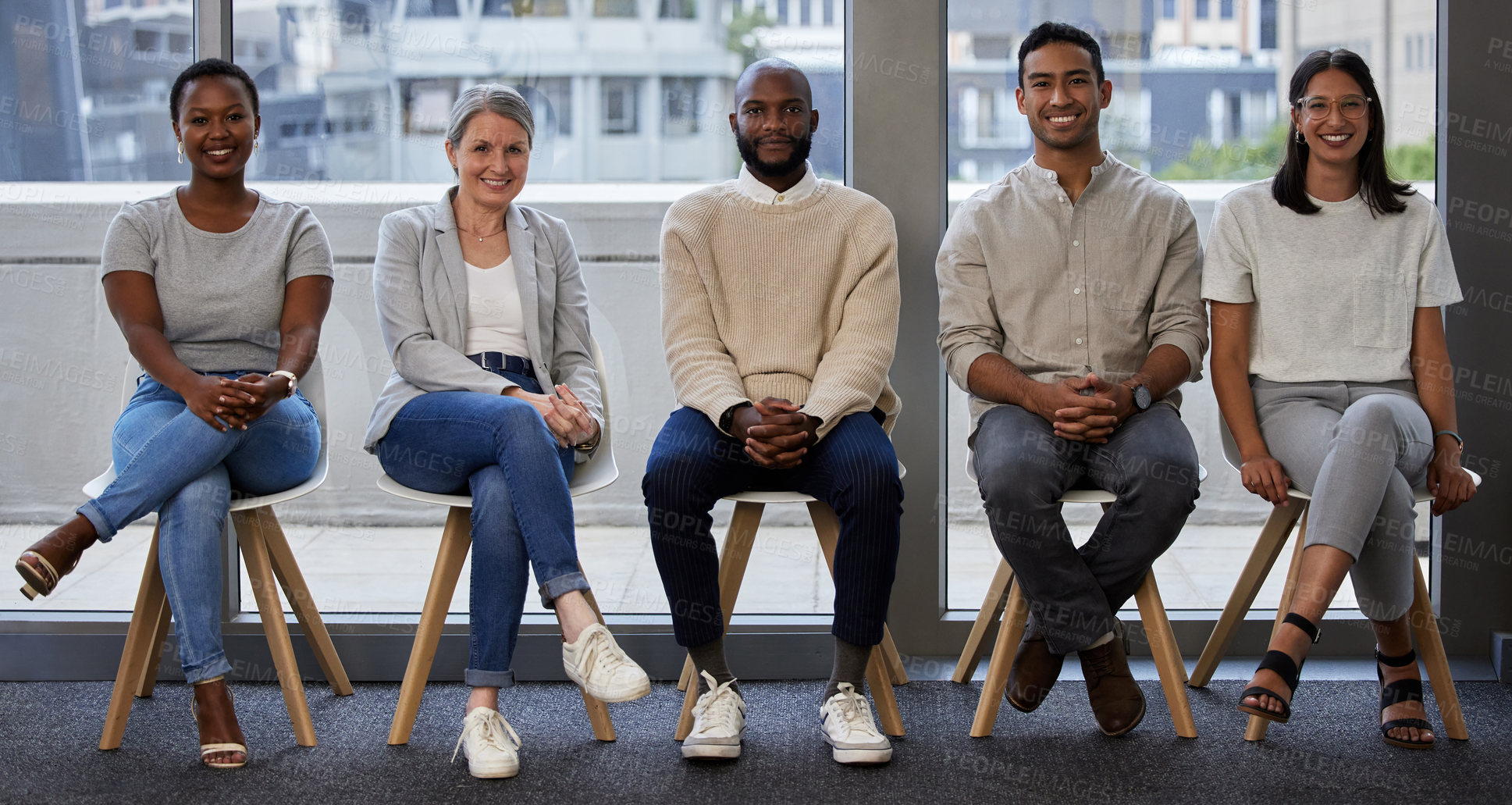 Buy stock photo Business people, portrait and waiting room with line for interview, career or job opportunity at office. Diversity, group or happy employees and candidates in row with smile on chairs at workplace