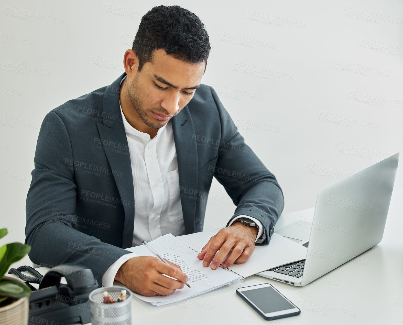 Buy stock photo Man, technology and writing on paperwork in office with contract, legal advisor or attorney at work. Male lawyer, laptop and pen with paper at desk for justice, estate tax or compliance at law firm