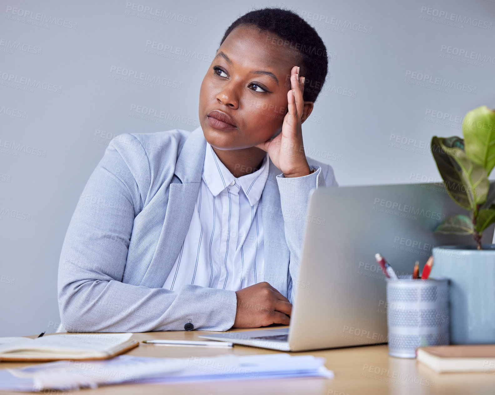 Buy stock photo Thinking, business and black woman on laptop in office for  planning, research and information with ideas for project solution. Contemplating, female person and brainstorming update of finance report