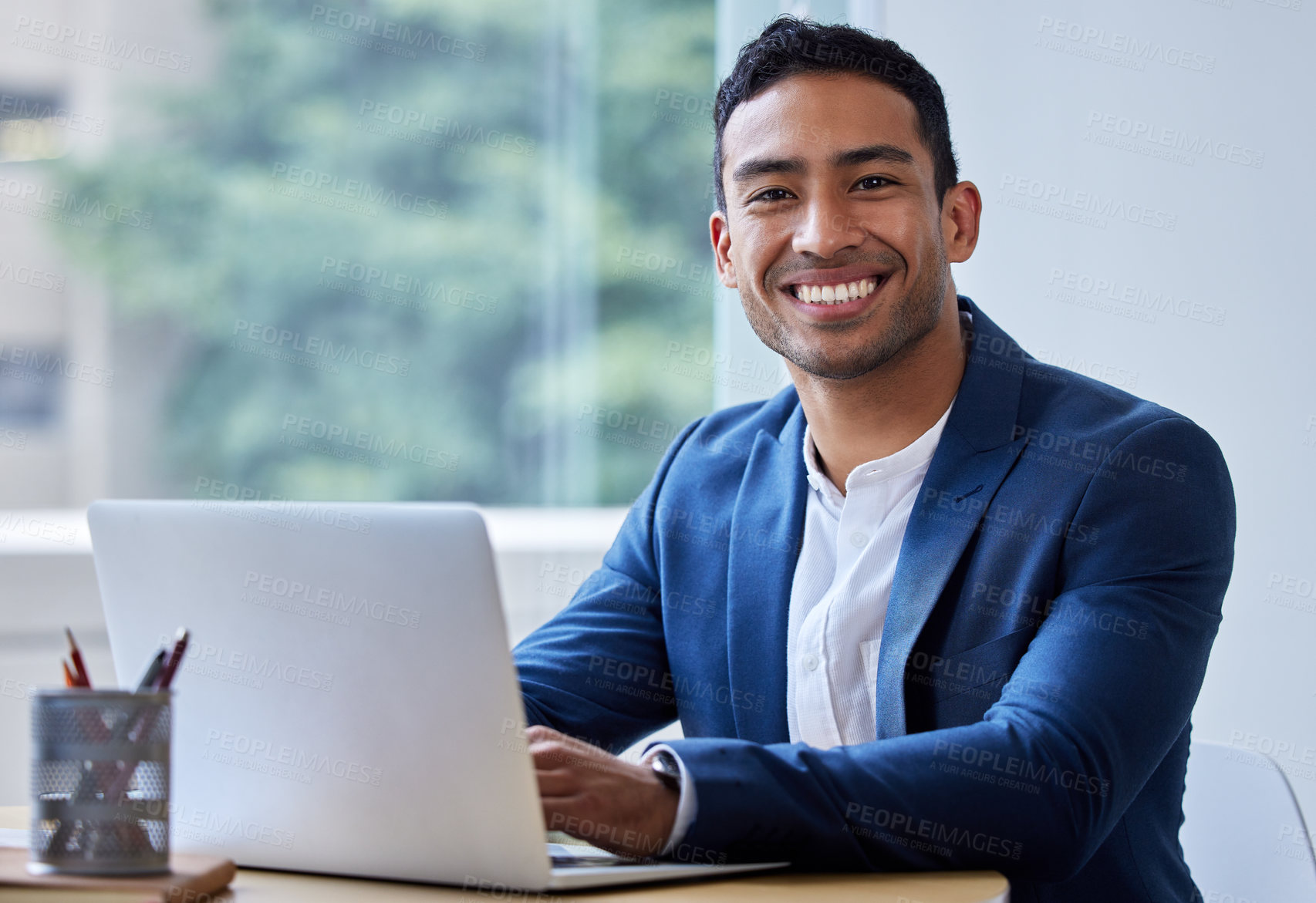 Buy stock photo Laptop, Asian man and happy as employee in office for career or job growth with opportunity. Portrait, smile and satisfied with pride or confident as accountant for company or business in corporate