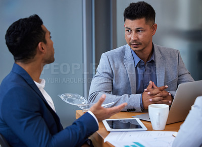 Buy stock photo Shot of a group of colleagues having a meeting and breakfast in a modern office