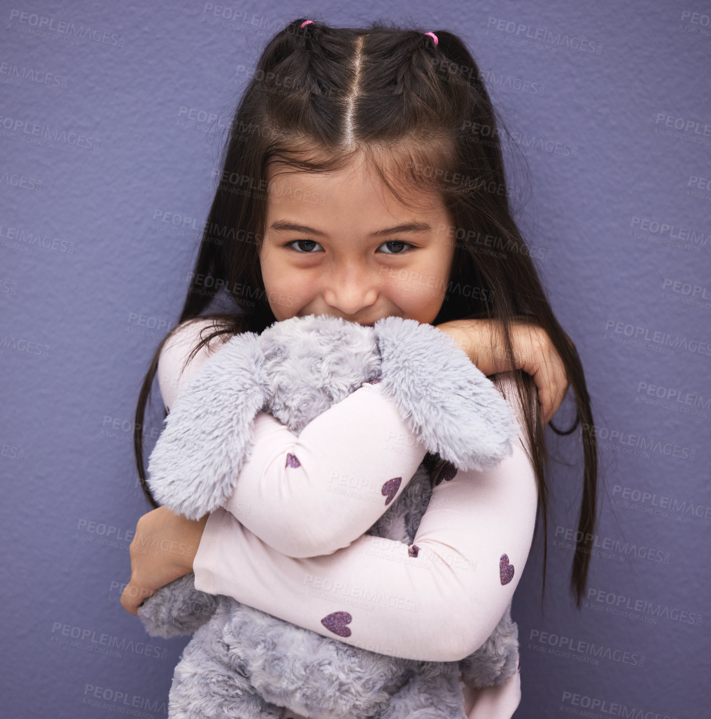 Buy stock photo Portrait, child and teddy bear by purple background for love, comfort and toy for hug or play. Mexican girl, orphan and stuffed animal by wall with happiness, kid and gift or donation for game  