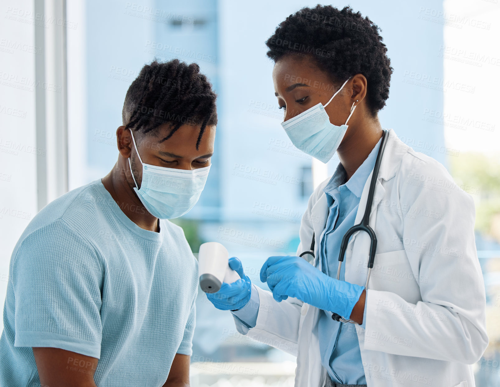 Buy stock photo Shot of a doctor showing her patient his temperature