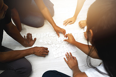 Buy stock photo Puzzle, floor and group of people for teamwork, solution and thinking, brainstorming or integration. Team building, game or development of women, men or team problem solving, synergy or collaboration