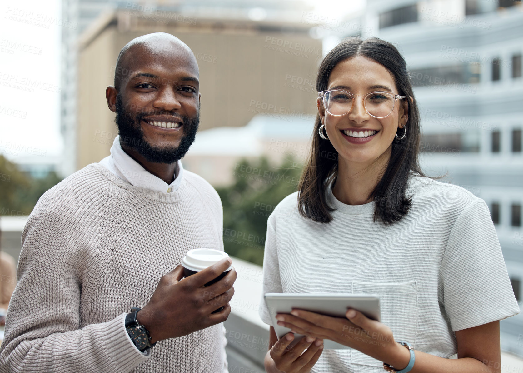 Buy stock photo Portrait, businesspeople with coffee and tablet on rooftop building together with smile. Friends on lunch, technology and happy colleagues smiling in city or urban on a balcony of a building