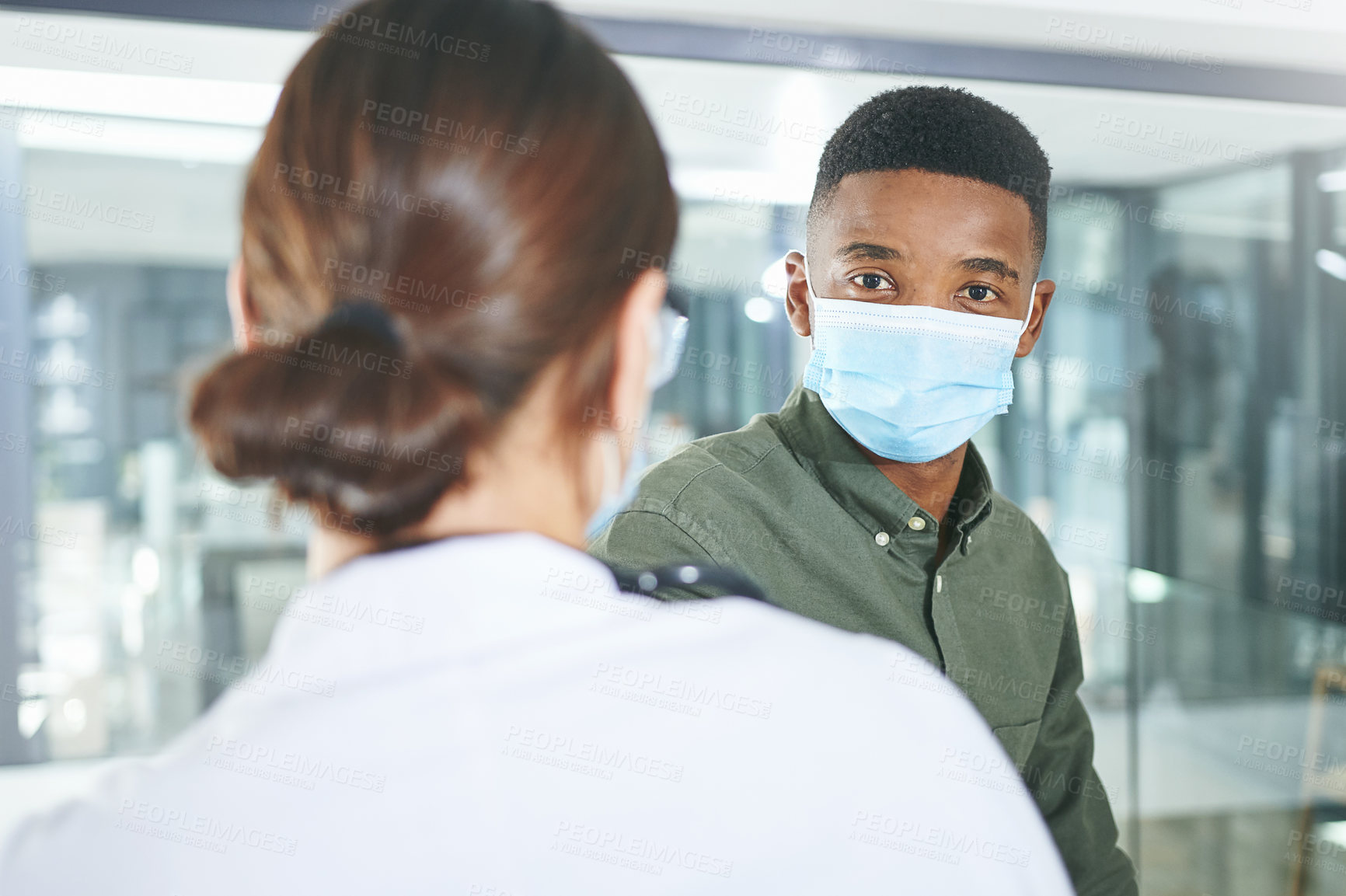 Buy stock photo Healthcare, doctor or man with consultation in clinic for medical service, routine checkup or diagnosis. Mask, professional or patient portrait in hospital for health update, treatment plan or advice