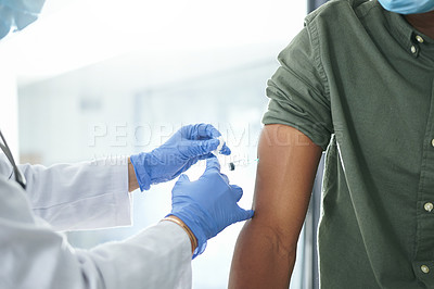 Buy stock photo Shot of an unrecognizable doctor giving a patient an injection in an office