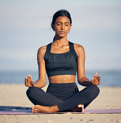 Buy stock photo Woman, relax and meditation with yoga mat at beach for inner peace, outdoor zen or spiritual wellness in nature. Calm female person or yogi meditating for awareness or stress relief by ocean coast
