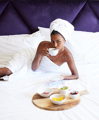 Buy stock photo Breakfast, bed and woman, relax and tea with fruit, shower and hotel for vacation and luxury. Thinking, Indian girl and idea of holiday, morning and food with nutrition, healthy and diet in trip