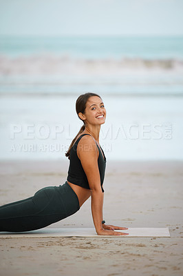 Buy stock photo Fitness, yoga and portrait of woman on beach for balance, stretching or wellness in morning. Exercise, smile and zen with happy person on sand by ocean or sea for holistic training or workout