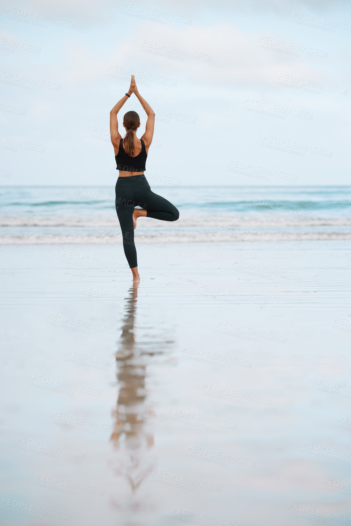 Buy stock photo Balance, fitness and yoga with woman on beach for inner peace, mental health or wellness in morning. Exercise, meditation and zen with back of person on sand by ocean for holistic training or workout