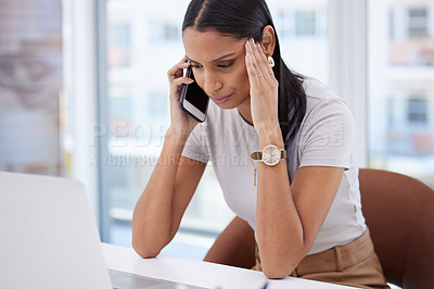 Buy stock photo Phone call, stress and business woman in office for b2b deal, partnership or merger for startup. Laptop, technology and female designer with burnout on mobile discussion with cellphone in workplace.