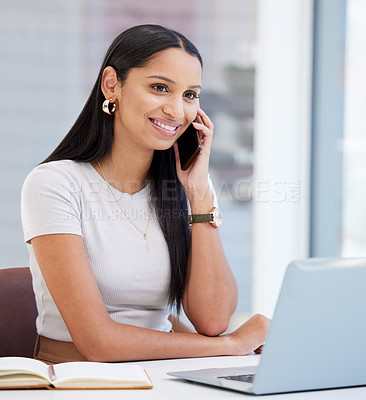 Buy stock photo Indian woman, phone call and smile at laptop in office as web designer in creative agency, networking or internet. Female person, notebook and cellphone at desk, market research or digital artist