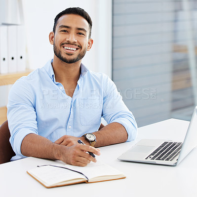 Buy stock photo Portrait, businessman writing in a book and with laptop smile at desk of his modern work office. Success or happiness, write in notebook and excited male person sit at table of his workstation 