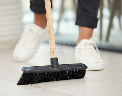 Buy stock photo Feet, broom and cleaner for sweeping in home, housekeeper and remove dirt or dust for hygiene. Person, house and brush for maid service in apartment, maintenance and worker for health or wellness