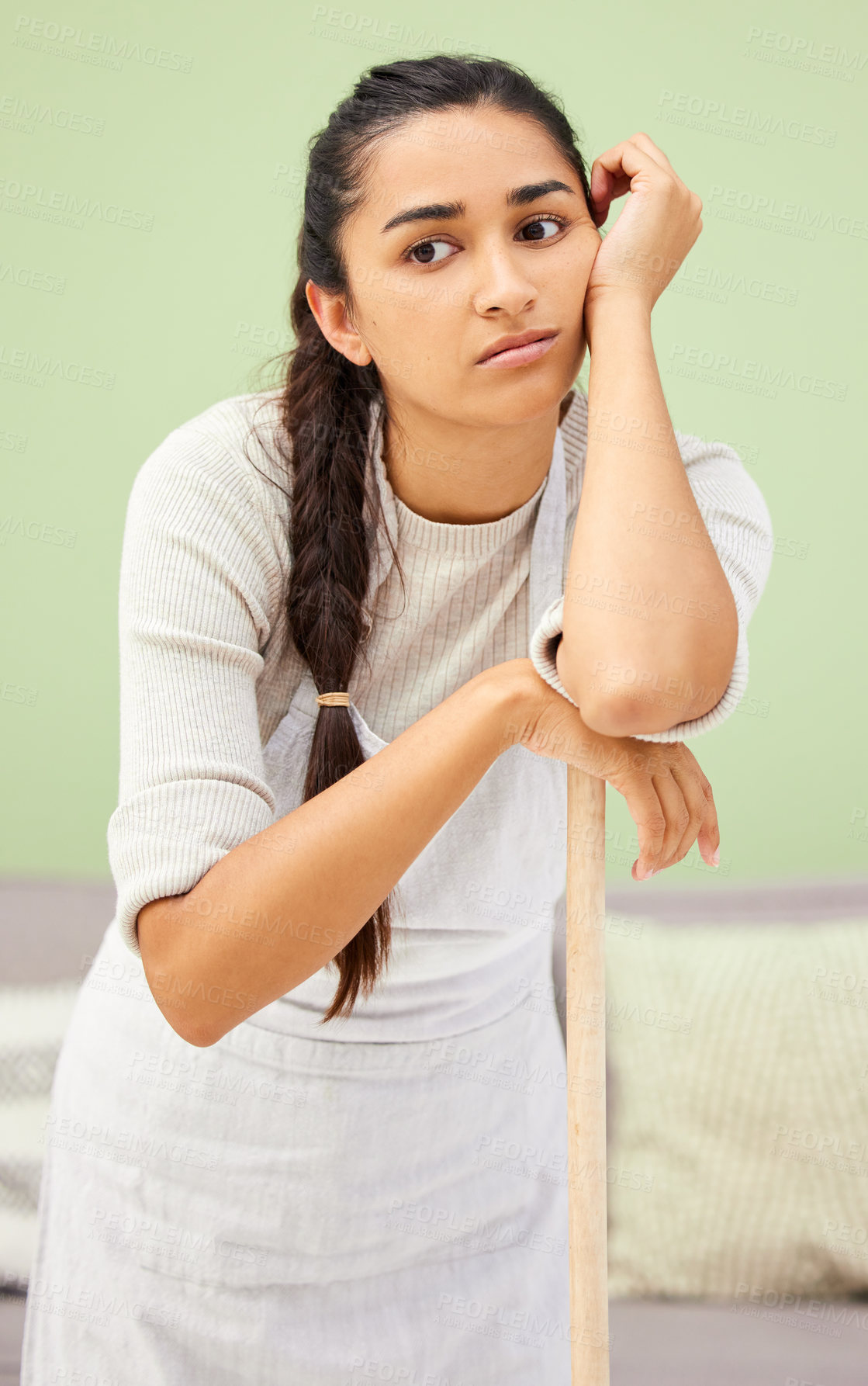 Buy stock photo Woman, mop and tired of cleaning in home with thinking, lazy and frustrated with disinfection for hygiene. Girl, person and domestic housework with ideas, bacteria and fatigue in living room in Italy